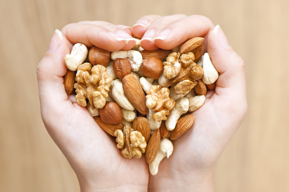 В чем проявляется польза орехов для здоровья?