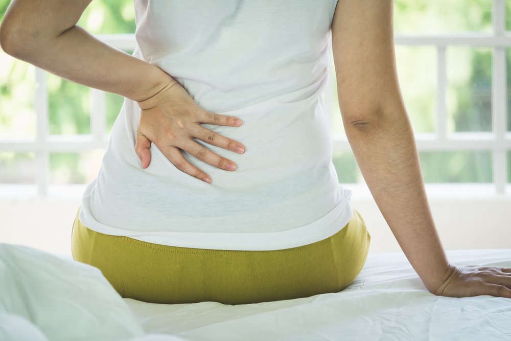 Боль в области спины: причина и следствие
