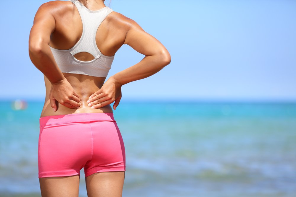 Почему возникают боли в спине