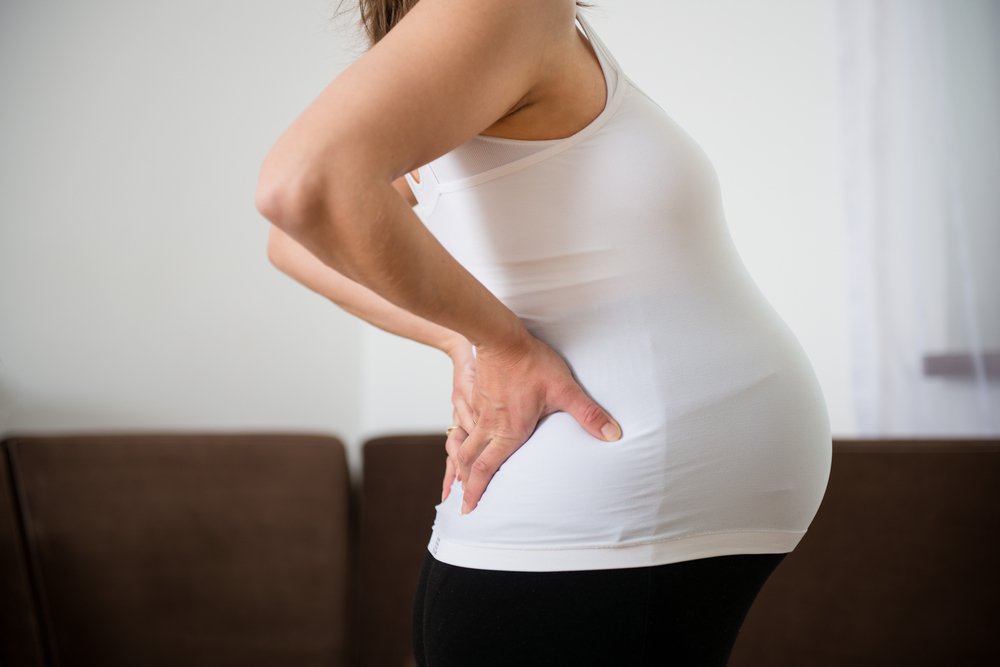 Причины болей в спине патологического характера во время беременности