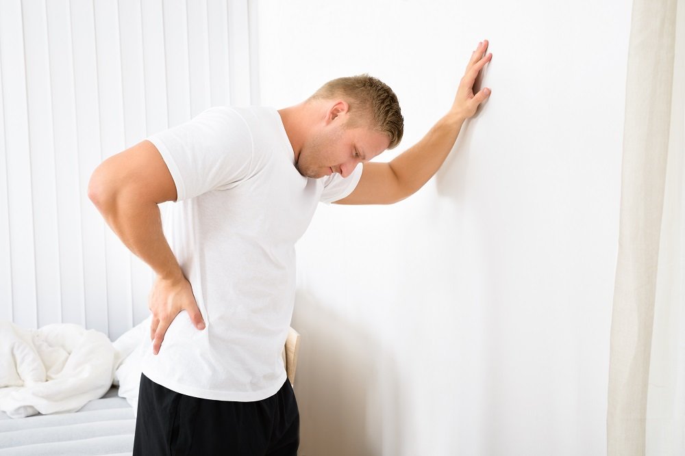 Факторы, провоцирующие боли в спине при проработке мышц живота