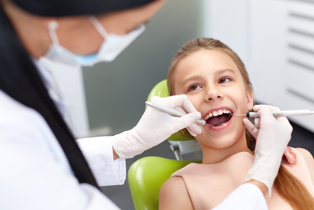 Лечение в кресле стоматолога