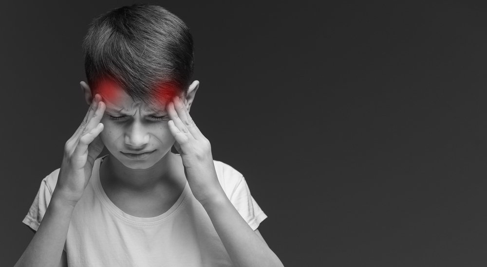Почему возникает головная боль у детей?
