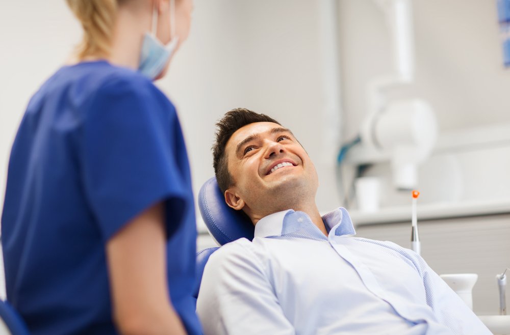 Лечение в кресле стоматологов