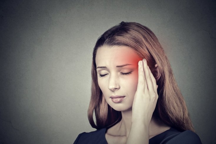 При мигрени болит половина головы